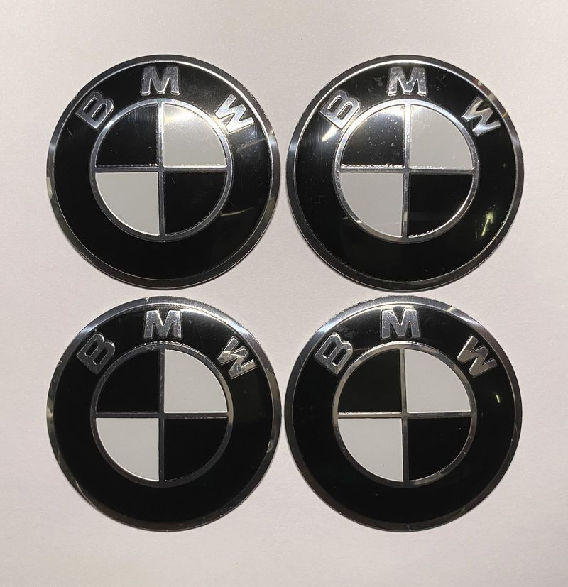 Этикетки на диски (метал)  диам. 56,5мм.  "BMW" черный  (4 шт.)