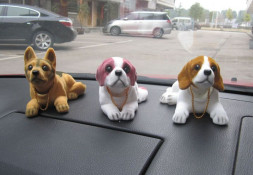 Собака на торпеду качающая головой Коричневая