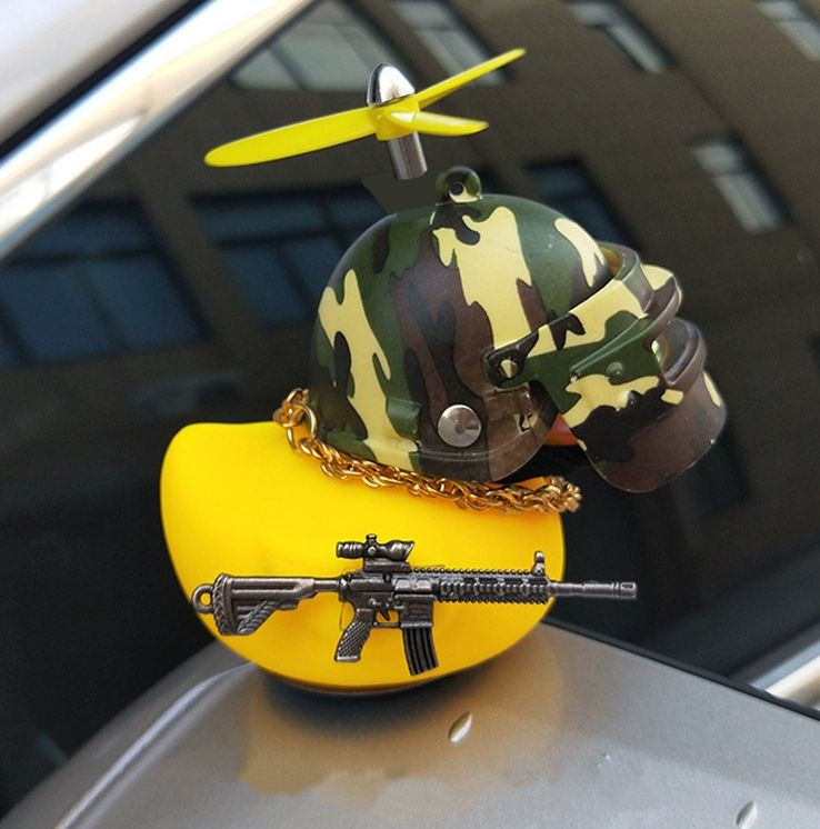 Игрушка на торпедо "УТКА" (сварщик с автоматом) хаки   9см*7,5см