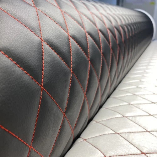 Экокожа на поролоне в рулоне  9,6м. x 1,43м. РОМБ черный с красной строчкой