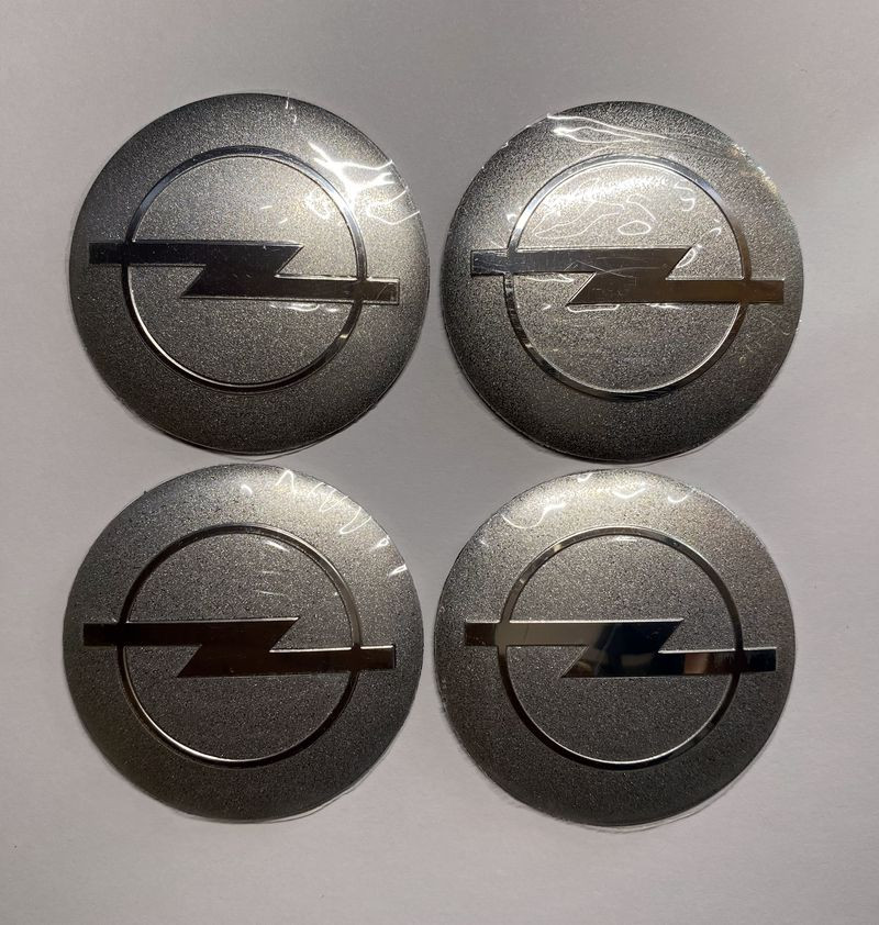 Этикетки на диски (метал)  диам. 56,5мм.  "OPEL" серебро  (4 шт.)