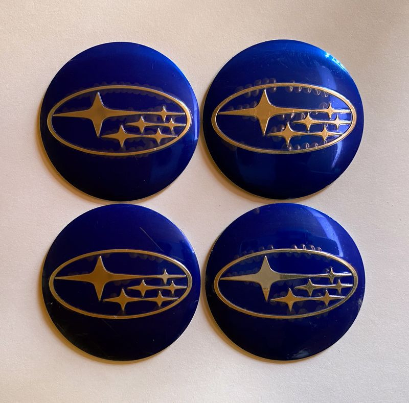 Этикетки на диски (метал)  диам. 56,5мм.  "SUBARU" синий  (4 шт.)