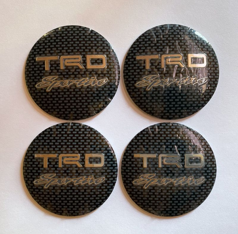 Этикетки на диски (метал)  диам. 56,5мм.  "TRD" карбон  (4 шт.)