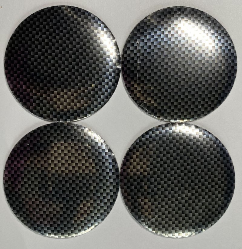 Этикетки на диски (метал)  диам. 56,5мм.  "один цвет" карбон  (4 шт.)